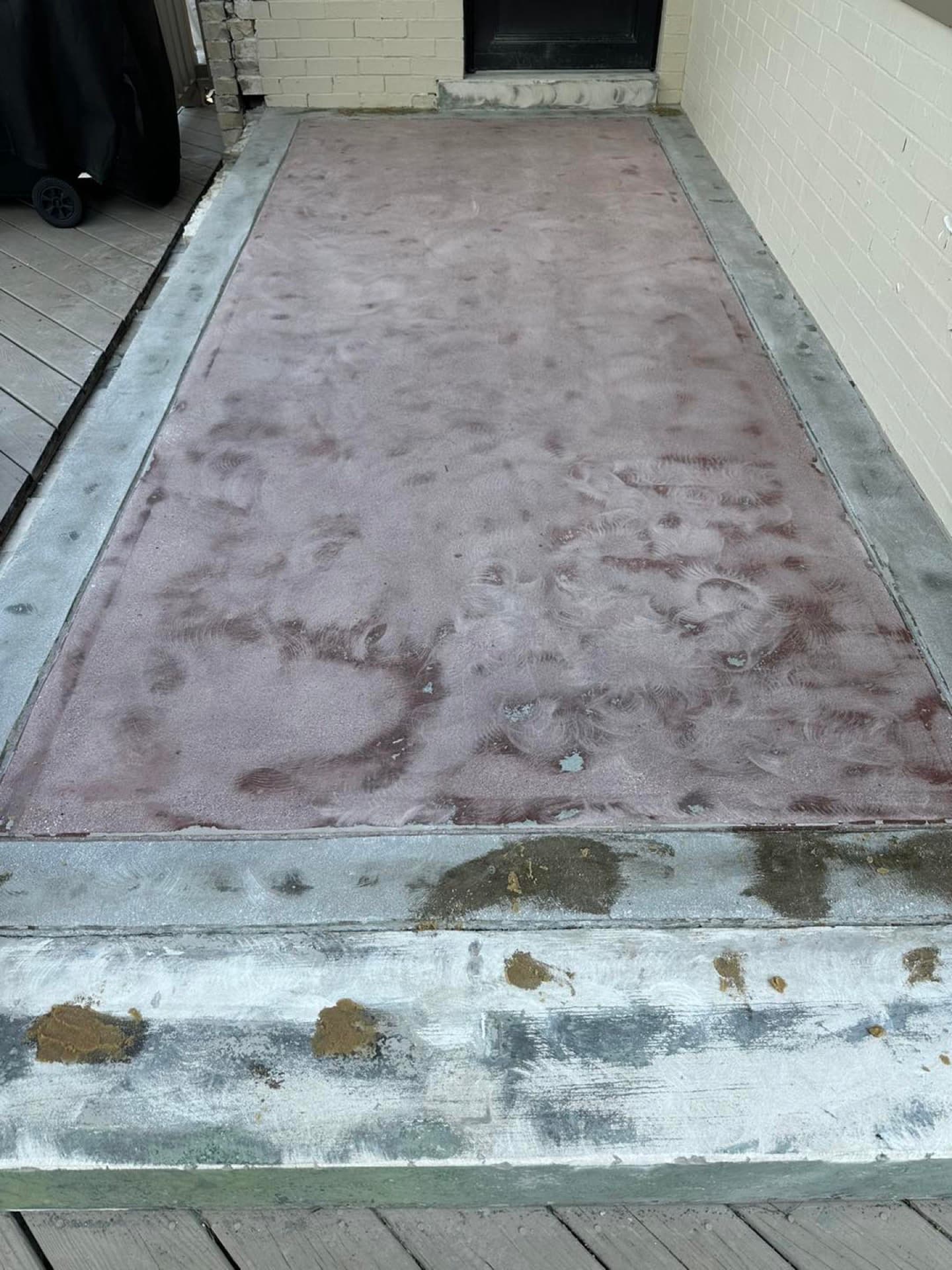 After: Tan flake front entry coating