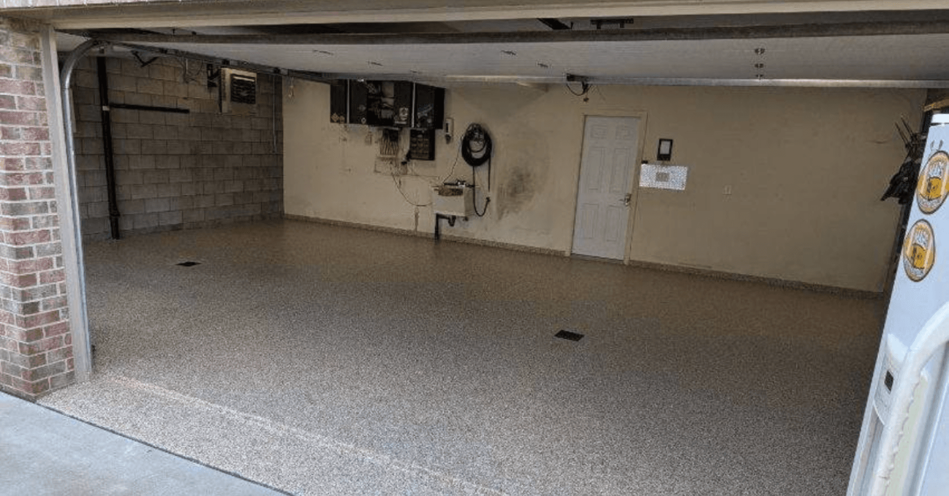 Glossy gray flake garage floor coating