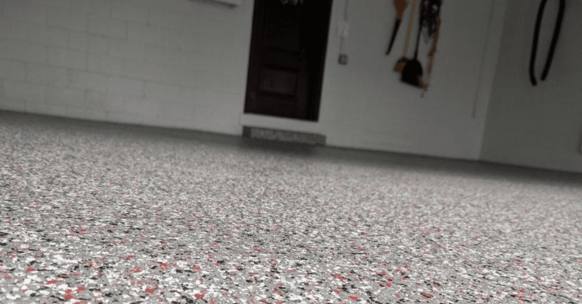 Custom red-accent flake garage floor