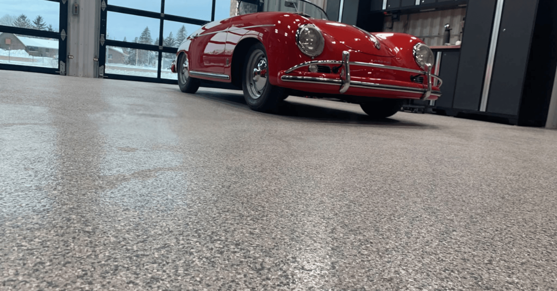 Classic red car on premium polyurea garage floor coating