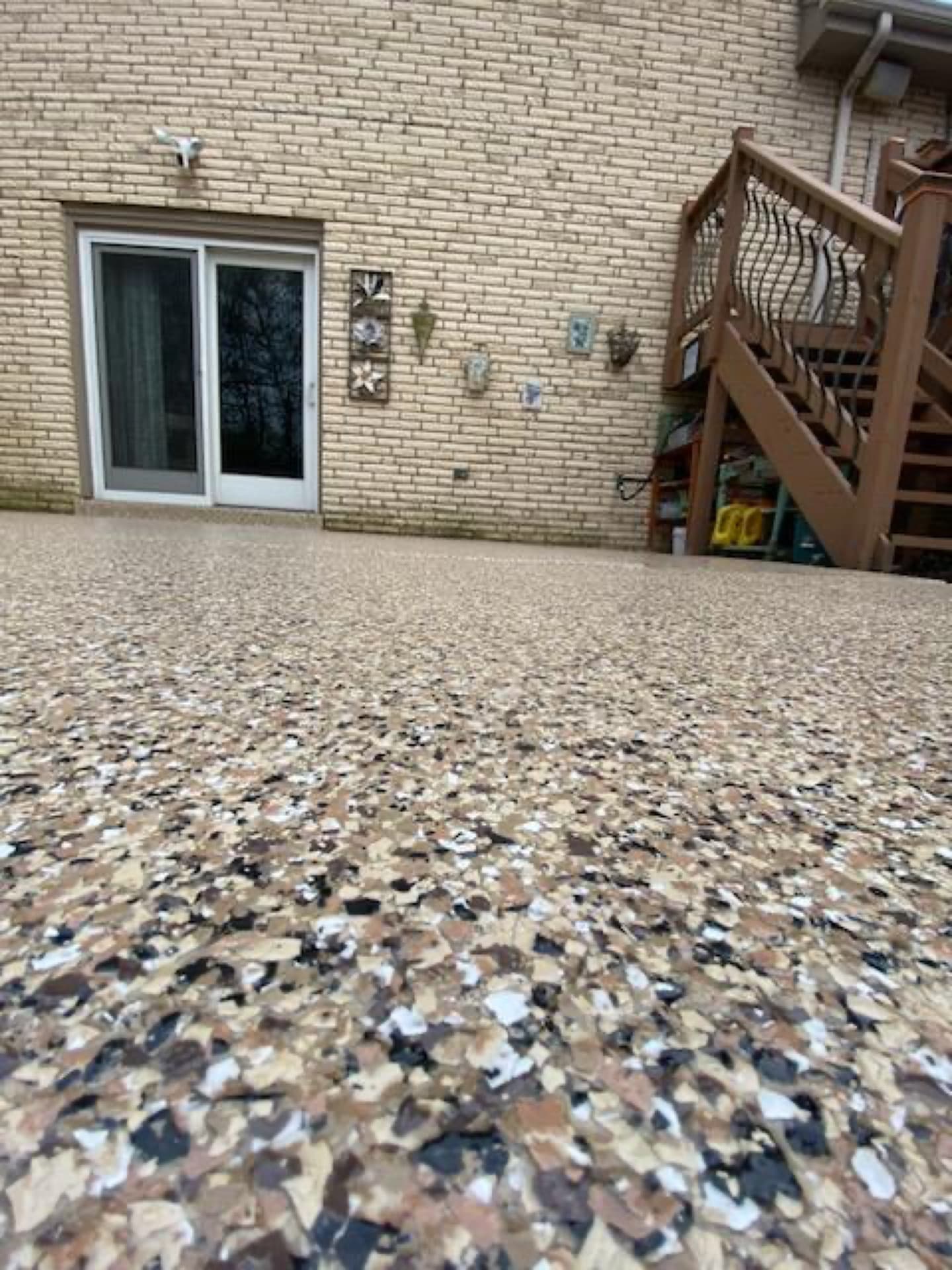 Back patio with deck stairs coating