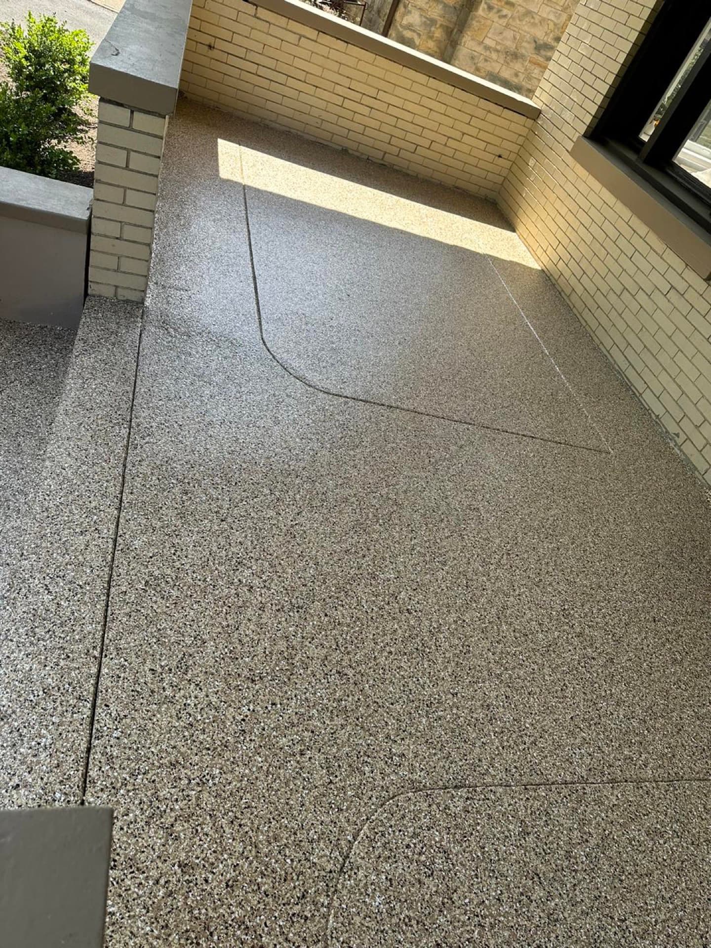 Outdoor patio and steps with gray flake polyurea coating — Cuyahoga County, OH