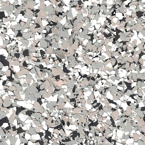 The image shows a close-up of a speckled surface with various shades of gray, white, and black randomly scattered throughout.