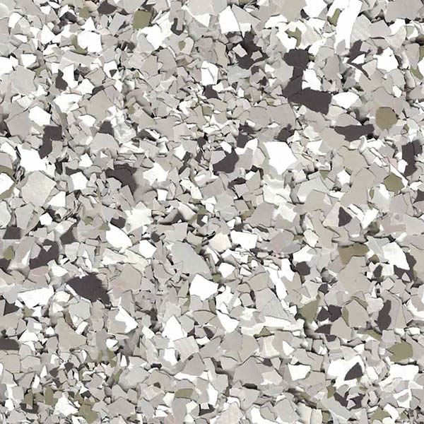 The image shows a textured surface pattern of scattered, irregularly shaped gray and white fragments, creating an abstract, mosaic-like appearance.