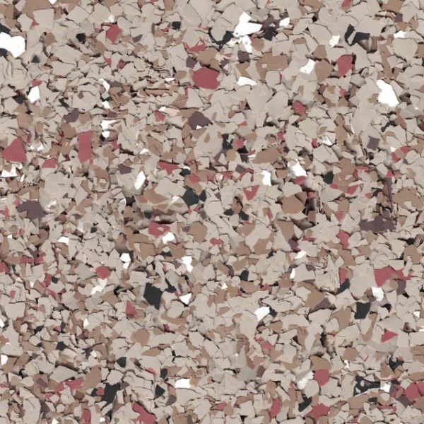 Abstract pattern of multicolored, irregularly shaped chips in beige, brown, red, and black, creating a textured, camouflage-like surface.