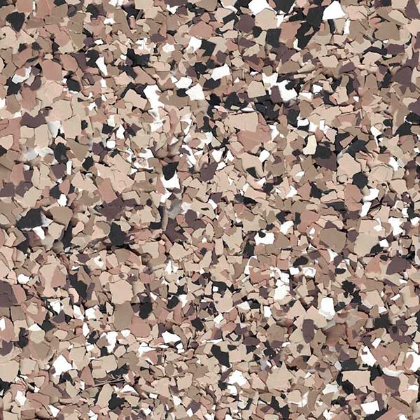 A close-up of a textured surface featuring a scattered, mixed pattern of beige, black, and white fragments, resembling a camouflage design.